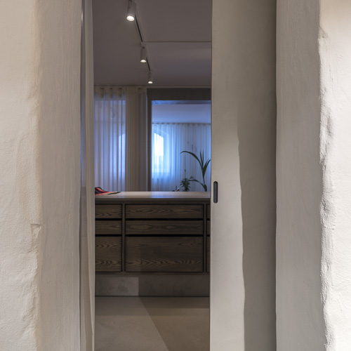 Sliding door with micro cement Mejlborg Basement